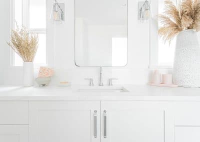 A picture of a bathroom with white countertop made by home renovation contractors in Langley, BC