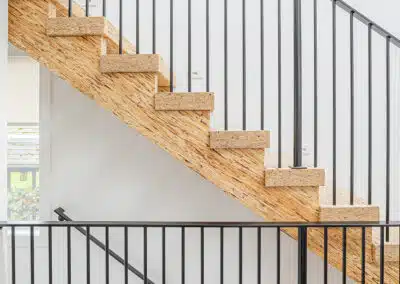 A wooden stairs custom build by Bowline Construction