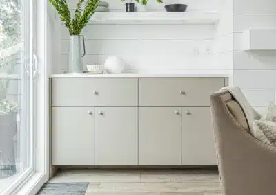 A white accent living room with modern design by design-build contractors in Langley, BC