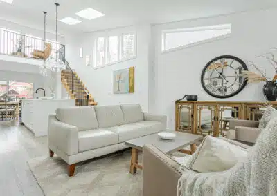 A white accent living room with modern design by design-build contractors in Langley, BC