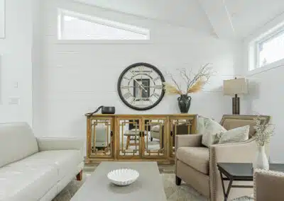 A white accent living room with modern design by design-build contractors in Langley, BC