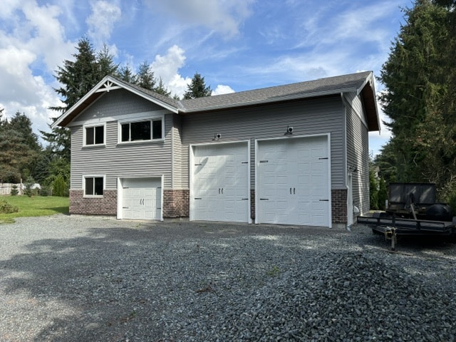 custom wooden storage shop garage shed with camper and golf cart inside