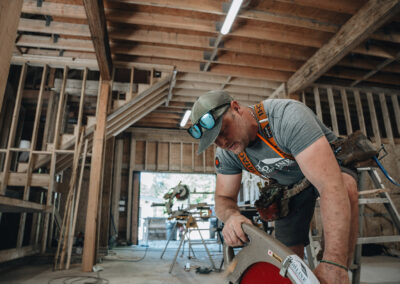 Bowline Construction team member in a process of pole barn construction in Langley, BC