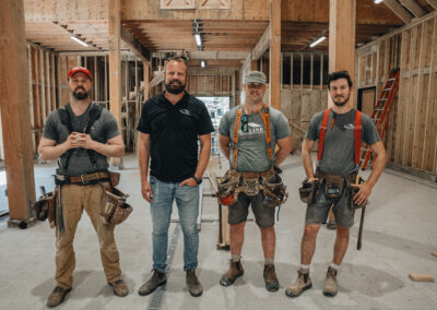 Bowline Construction pole barn construction team members inside a pole barn under construction in Langley, BC