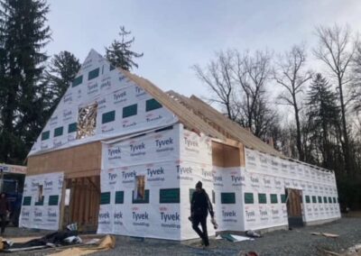 A pole barn under construction with Tyvek HomeWrap by Bowline Construction in Langley, BC