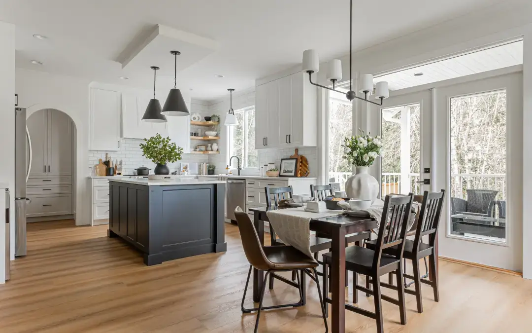 Modern renovated kitchen and dining area with sleek finishes and open design by Bowline Construction in Langley, BC