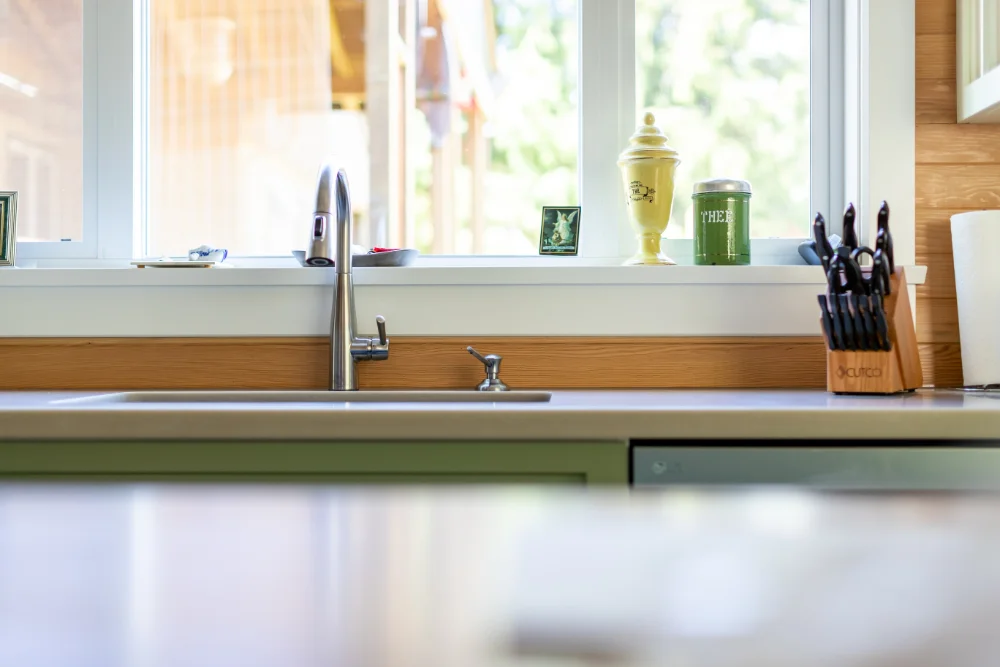 Bright kitchen sink and countertop designed for modern home renovations Abbotsford by Bowline Construction in Abbotsford, BC